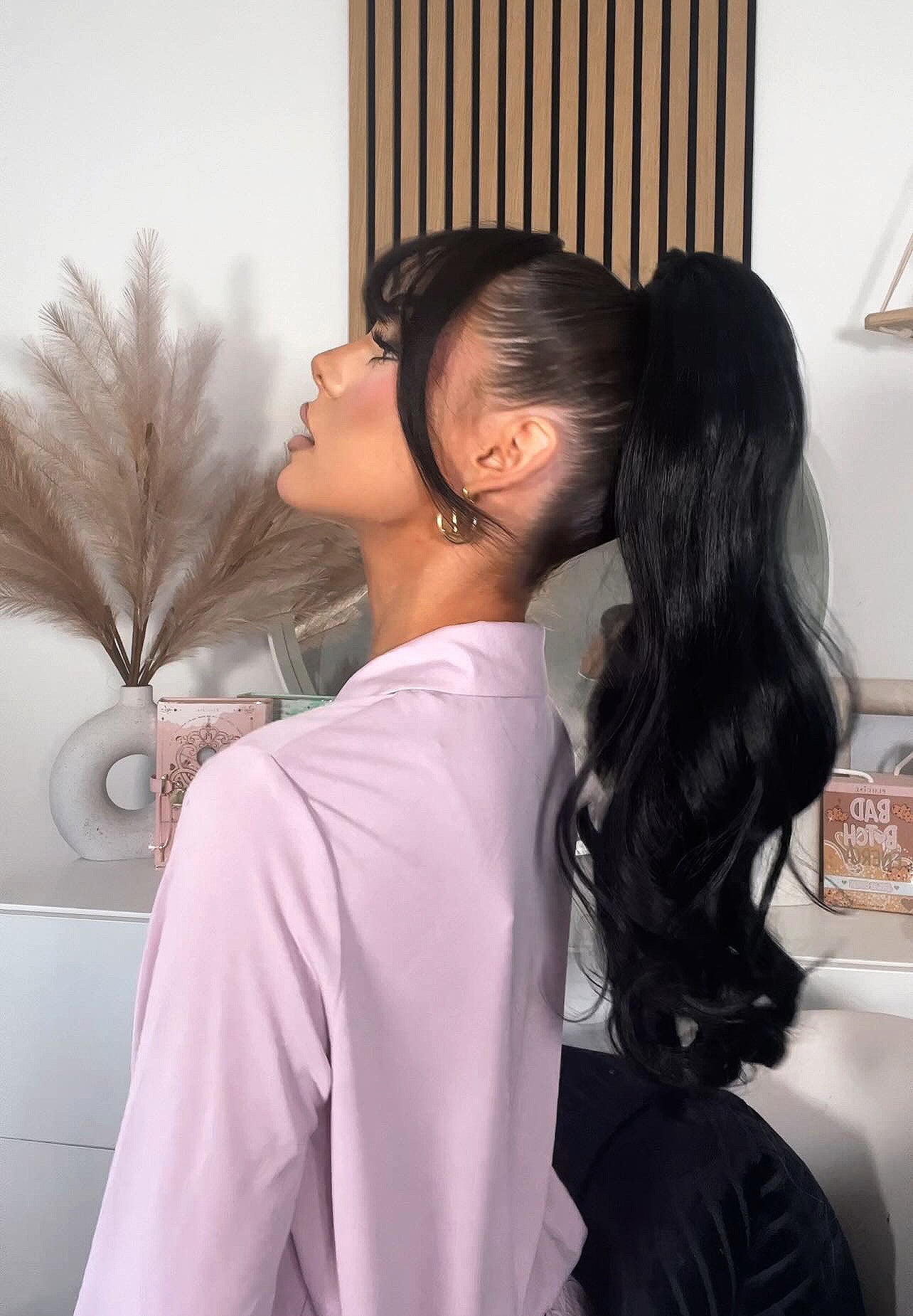 Copy this trendy hairstyle with with 23" Curly Ponytail