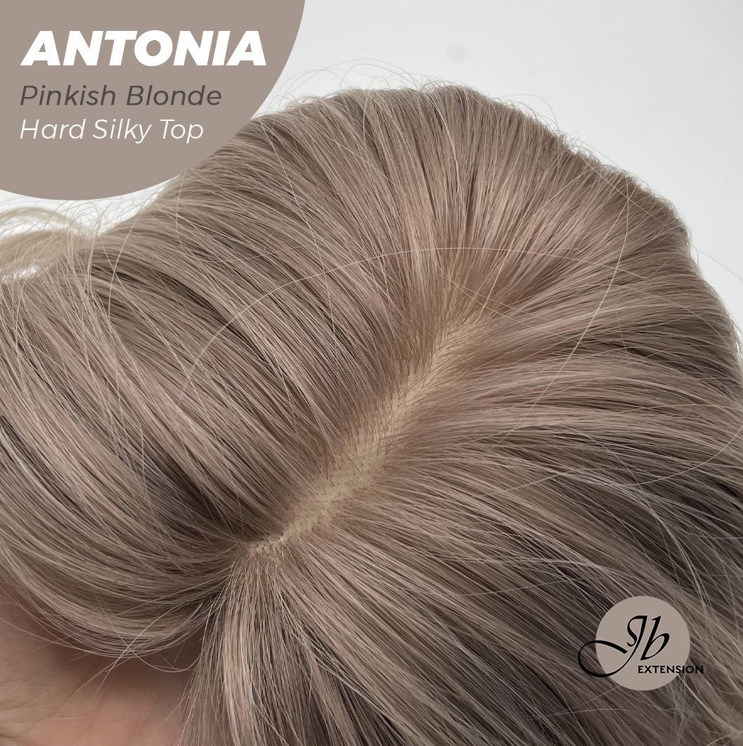 JBEXTENSION 28 Inches Scalpiana Long Curly Pinkish Blonde 3.5X4 Hard Silky Top Natural Scalp Effect Wig ANTONIA PINKISH BLONDE
